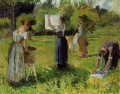 lavanderas en eragny 1 Camille Pissarro